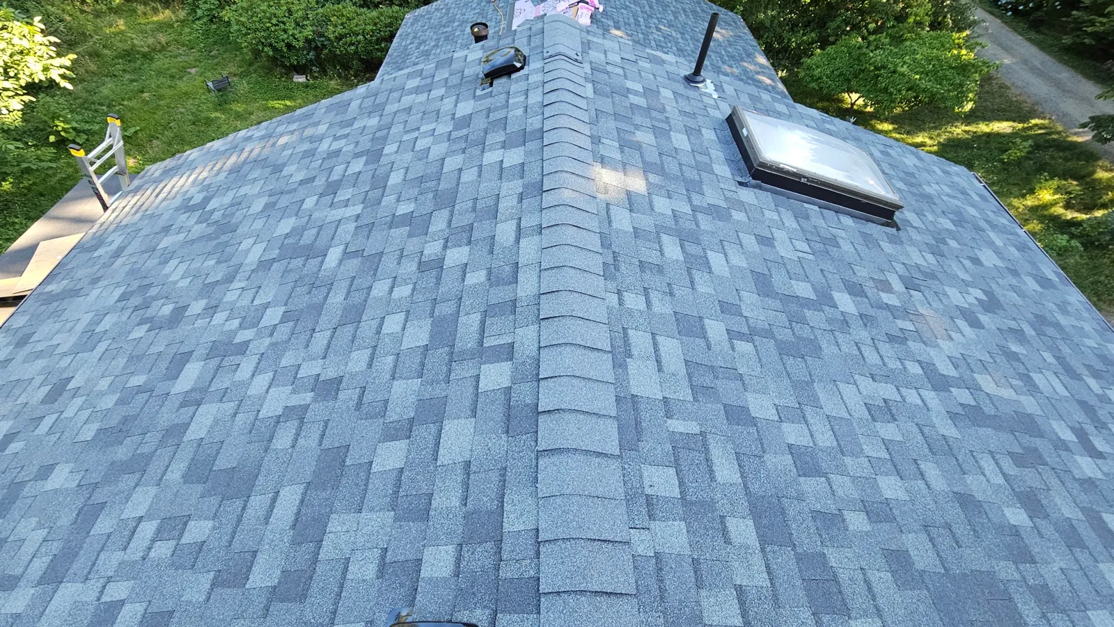 After: new shingle roof on the house